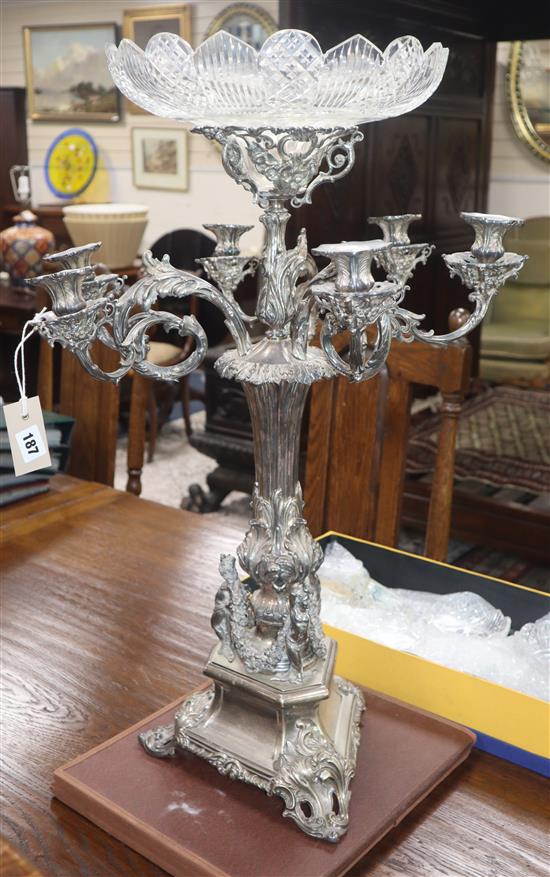 A Victorian plated centrepiece with four candle arms and glass tazza